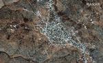 Et satellitfoto viser angiveligt stedet, hvor IS-leder Abu Bakr al-Baghdadi opholdt sig, da amerikanske specialstyrker fandt ham. Foto: Maxar Technologies/Ritzau Scanpix