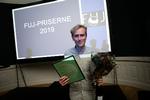 Politikens journalist Kristian Corfixen vinder formidlingsprisen ved uddelingen af årets FUJ-priser.  Foto: Klaus Holsting