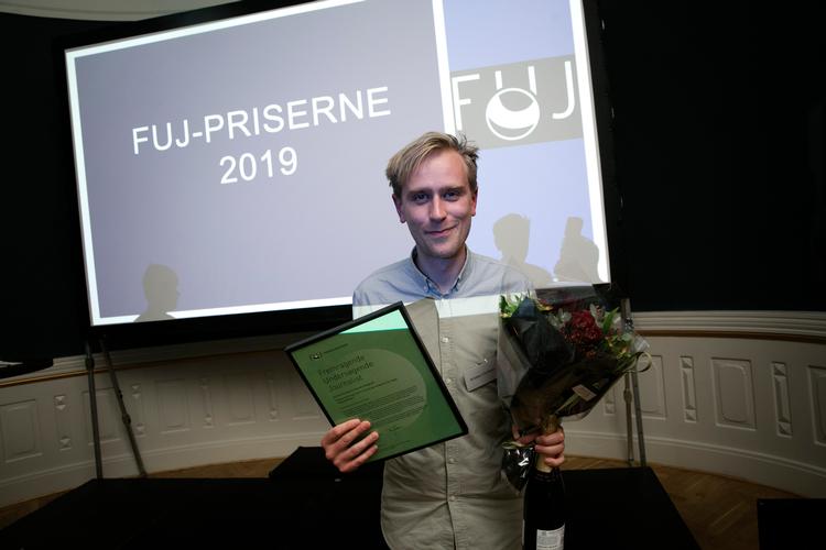 Politikens journalist Kristian Corfixen vinder formidlingsprisen ved uddelingen af årets FUJ-priser.  Foto: Klaus Holsting
