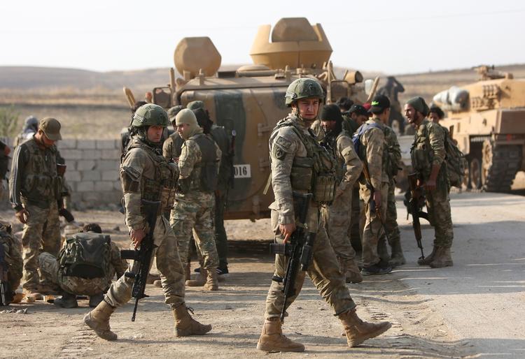 En tyrkisk soldat fotograferet på grænsen til Syrien i slutningen af oktober.  Foto: Nazeer Al-khatib/Ritzau Scanpix