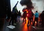 Iranske demonstrationer har bredt sig, siden præstestyret i weekenden besluttede at hæve benzinpriserne dramatisk.
) per annum. (Photo by - / AFP)
   Foto: -/Ritzau Scanpix