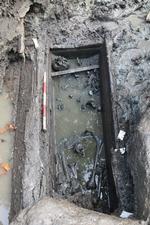 En ligkiste med knogler fra 1700-tallet, var ingen overraskelse for arkæologer, der forventer, at der stadig ligger mange flere kister gemt under mudderet. Foto: Københavns Museum