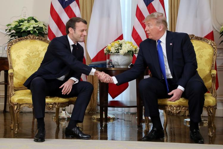 Donald Trump og Emmanuel Macron under deres møde i London.  Foto: Ludovic Marin/Ritzau Scanpix