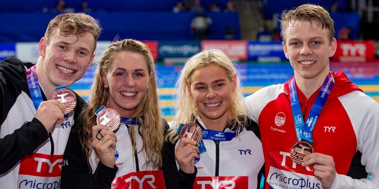 En dansk rekord i 4x50 meter medley sikrede kvartetten med Mathias Zander Rysgaard, Jeanette Ottesen, Pernille Blume og Tobias Bjerg bronzemedaljerne.. Foto: Patrick Kraemer/Dansk Svømmeunion