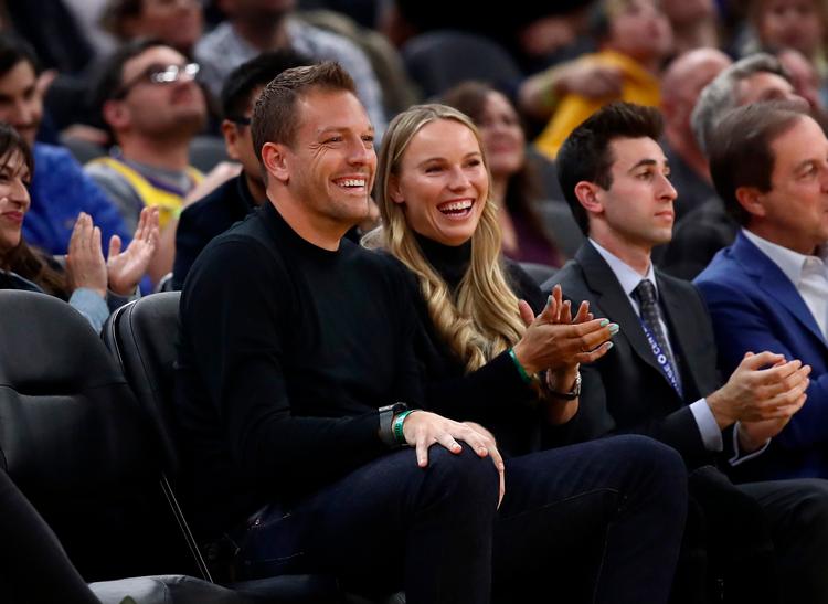 Efter Caroline Wozniacki sidste år blev gift med den tidligere basketballspiller David Lee, har hun fundet ud af, at der er andre ting hun hellere vil end at spille tennis professionelt. Danmarks største tennisstjerne trækker stikket til den aktive karriere, når Australian Open er slut. Foto: Ezra Shaw/Ritzau Scanpix