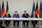 Den ukrainske præsident Volodymyr Zelensky mødtes i Paris med Tysklands kansler, Angela Merkel , Frankrigs præsident, Emmanuel Macron, og Ruslands præsident Vladimir Putin.
 Foto: Ludovic Marin/Ritzau Scanpix