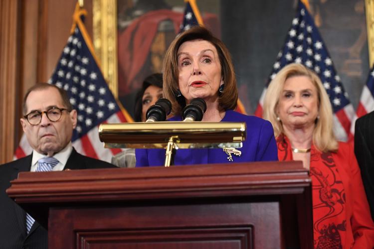 Onsdag stemmer Repræsentanternes Hus om rigsretssag mod præsident, Donald Trump. En godkendelse vil sende sagen videre til Senatet, hvor rigsretssagen mod Trump forventes at begynde i januar. Foto: Saul Loeb/Ritzau Scanpix