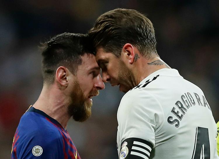 Det er tre et halvt år siden, Real Madrid og Sergio Ramos (t.h) har besejret Messi og Barcelona i en ligakamp.  Foto: Manu Fernandez/Ritzau Scanpix