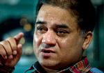 Den 50-årige økonom Ilham Tohti har siddet i fængsel siden 2014, og ingen har hørt fra ham i to år. Derfor var det hans datter, der onsdag modtog Europa Parlamentets Sakharov-pris på hans vegne.  Foto: Andy Wong/Ritzau Scanpix