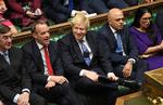 »Nu bryder vi dødvandet og får Brexit overstået«, jublede premierminister Boris Johnson fredag i parlamentet.
   Foto: Jessica Taylor/Ritzau Scanpix