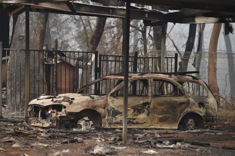 En bil nær Sydney er brændt ud efter brandene i Australien. Foto: Peter Parks/Ritzau Scanpix