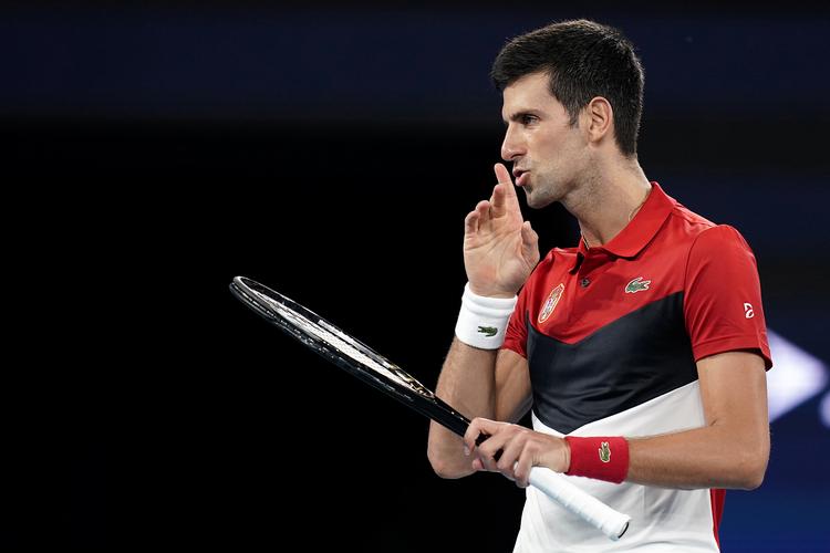 Novak Djokovic kom ind i det nye år med en hårdt tilkæmpet sejr, da han lørdag vandt over den sydafrikanske superserver Kevin Anderson. Foto: Stringer/Ritzau Scanpix