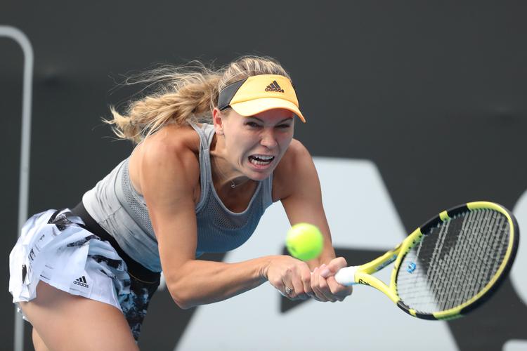 I karrierens næstsidste turnering fik Caroline Wozniacki tirsdag morgen en god start, da hun sikkert vandt sin kamp i Auckland.
   Foto: Michael Bradley/Ritzau Scanpix
