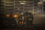 Mange biler brænder i et parkeringshus, som er delvist kollapset, ved Stavangers lufthavn.  Foto: Carina Johansen/Ritzau Scanpix