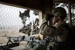 De evakuerede danske soldater fra bombet base i Irak ved endnu ikke, om de skal tilbage til basen eller hjem. Her ses en dansk soldat holde vagt ved Al Asad Air Base i Irak i 2017 (arkivfoto).
   Foto: Mads Nissen/POLFOTO