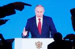 Vladimir Putin under sin årlige tale i parlamentet tidligere i dag.  Foto: Maxim Shemetov/Ritzau Scanpix