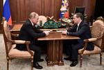 Vladimir Putin og Dmitrij Medvedev fotograferet under et møde tidligere i dag.  Foto: Sputnik/Ritzau Scanpix