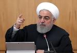 Folket kræver mangfoldighed, siger Irans præsident Rouhani ved et regeringsmøde i Teheran. Han kritiserer, at tusinder af moderate politikere nægtes ret til opstilling ved det kommende valg. Foto: -/Ritzau Scanpix