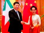 Kinas præsident Xi Jinping og Myanmars leder Aung San Suu Kyi. Målet med mødet mellem de to ledere var at styrke de politiske og økonomiske bånd mellem landene.  Foto: Nyein Chan Naing/Ritzau Scanpix