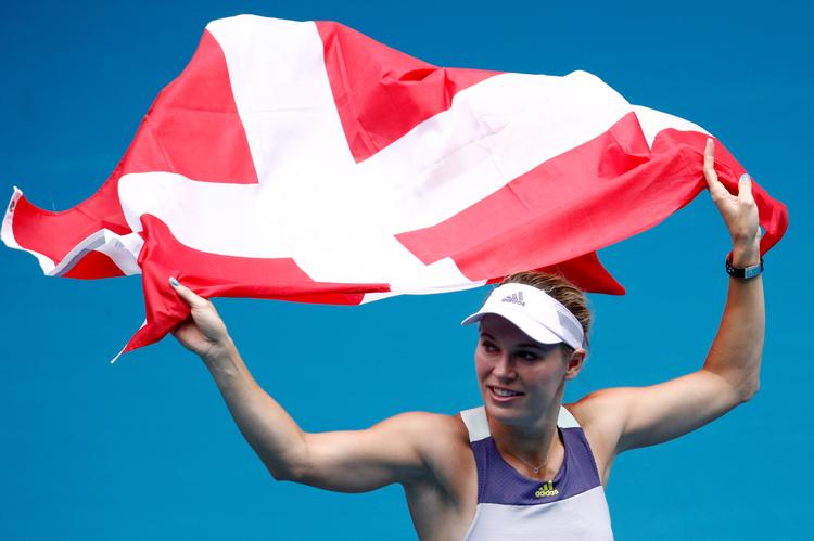 Caroline Wozniacki ser frem til at spille karrierens allersidste opgør, når hun til maj møder Serena Williams i en showkamp i København. Men derudover skal ketsjeren fremover maksimalt bruges, når hun ikke gider løbe en tur eller gå i træningscenteret.
   Foto: Edgar Su/Ritzau Scanpix