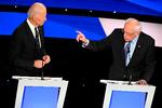 Joe Biden (tv.) og Bernie Sanders krydser klinger og politik. Lige nu hælder vælgerne mest til Sanders, men målingerne er usikre. Foto: Robyn Beck/Ritzau Scanpix