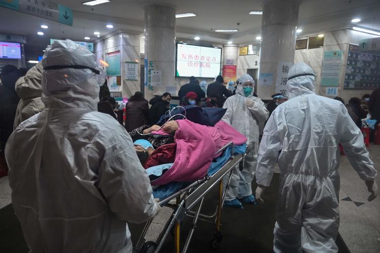Hospitalerne i den kinesiske by Wuhan er overfyldte, og nu vil myndighederne på rekordtid bygge to helt nye hospitaler, som kun skal tage sig af patienter smittet med coronavirus.   Foto: Hector Retamal/Ritzau Scanpix