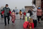 Folk bærer masker i Beijing.  Foto: Nicolas Asfouri/Ritzau Scanpix