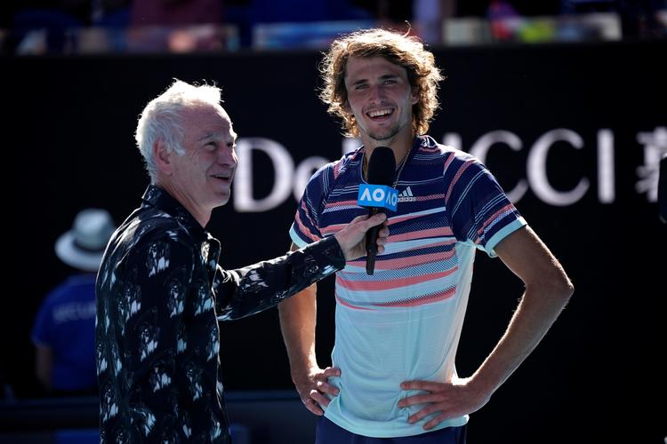 Efter at have kvalificeret sig til sin første grandslamsemifinale blev Alexander Zverev (th.) interviewet på banen af John McEnroe.
   Foto: Kim Hong-ji/Ritzau Scanpix