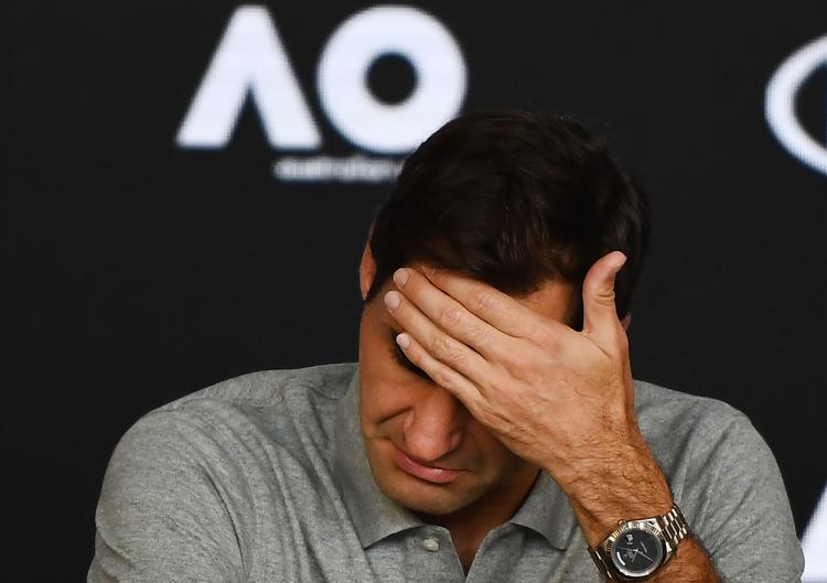 På Australian Opens 11. konkurrencedag måtte Roger Federer forklare, hvorfor han tabte til Novak Djokovic, og den slags er aldrig et rart emne.   Foto: Manan Vatsyayana/Ritzau Scanpix