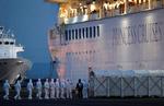 Det er på krydstogtskibet 'The Diamond Princess', der ligger i havn i Yokohama i Japan, at en udbrud af coronavirussen finder sted. 130 personer ombord på skibet er smittet.  Foto: Kim Kyung Hoon/Ritzau Scanpix