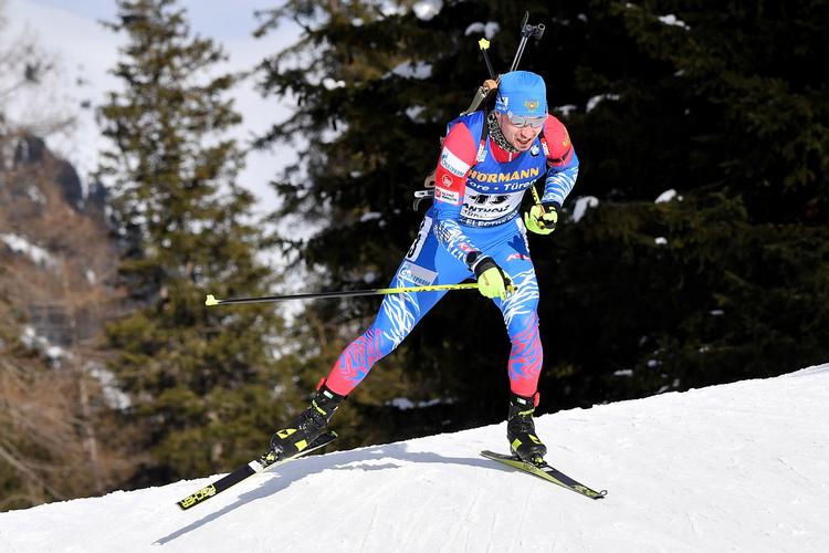 Alexander Loginov var slet ikke nævnt blandt favoritterne til lørdagens sprint ved VM i skiskydning, men han sluttede øverst på podiet. Foto: Marco Bertorello/Ritzau Scanpix