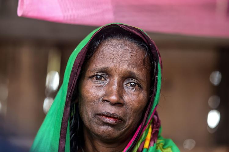 Mosammat Rashida mistede sin mand, der blev dræbt af en tiger i junglen, er blevet udstødt i den landsby, Shyamnagar i Bangladesh, hvor hun bor.  Foto: Munir Uz Zaman/Ritzau Scanpix