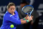 36-årige Kim Clijsters har bestemt ikke glemt at spille tennis, men der er et stykke vej til toppen.  Foto: Karim Sahib/Ritzau Scanpix