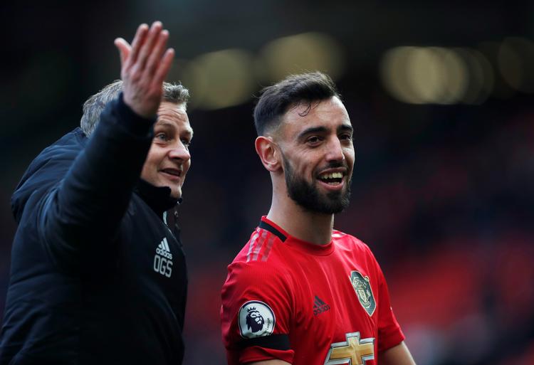  United-manager Ole Gunnar Solskæer og  Bruno Fernandes var i vældigt humør efter 3-0-sejren, hvori Fernandes scorede sit første mål for den engelske klub.  Foto: Lee Smith/Ritzau Scanpix