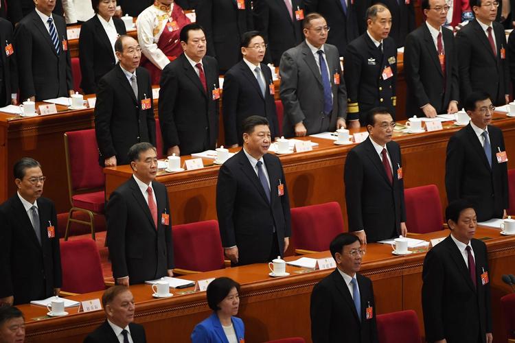 Kinas præsident, Xi Jinping, fotograferet ved kongressen sidste år. Han ses i midten af billedet.  Foto: Greg Baker/Ritzau Scanpix