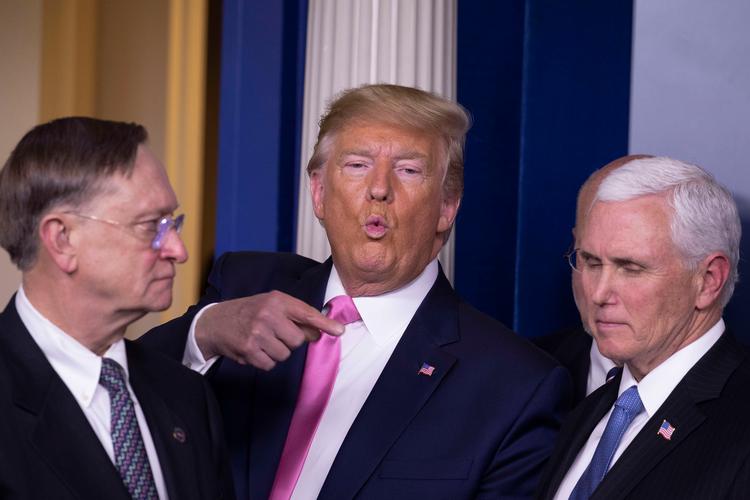 Donald Trump giver vicepræsident Mike Pence (t.h.) en nøglerolle. Foto: Tasos Katopodis/Ritzau Scanpix