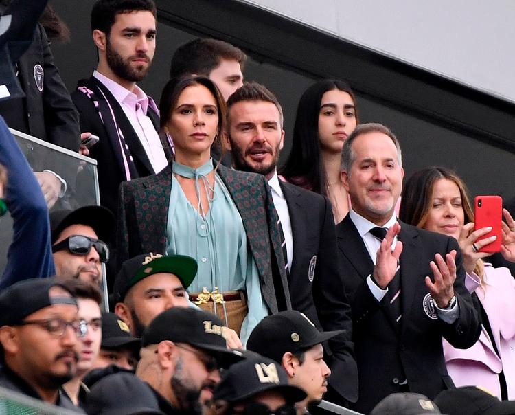 David Beckham og hustru Victoria Beckham på lægterne i Los Angeles.  Foto: Harry How/Ritzau Scanpix
