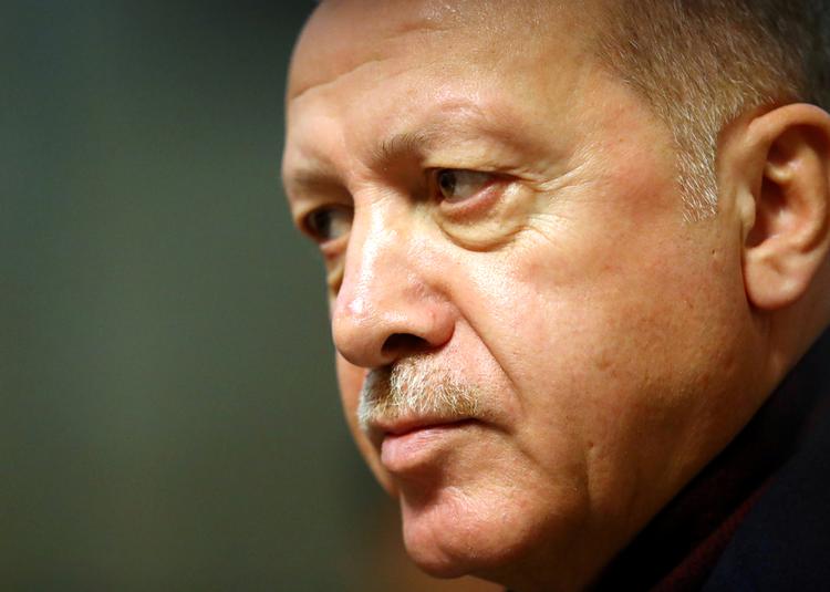 Den tyrkiske præsident, Recep Tayyip Erdogan, valgte at åbne Tyrkiets grænser til Europa i et forsøg på at presse EU til at tage mere ansvar for syriske flygtninge og migranter. Foto: Denis Balibouse/Ritzau Scanpix