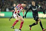 AaB's Tom van Weert i duel mod FC Københavns Carlos Zeca i kvartfinalekampen mellem Aab og FC København i Sydbank Pokalen. AaB vandt kampen 2-0 og skal i semifinalen møde AGF. Foto: Henning Bagger/Ritzau Scanpix