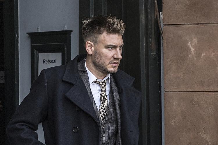 Nicklas Bendtner på vej ud af retten i september 2018, efter at han var blevet idømt 50 dages fængsel for vold.  Foto: Mogens Flindt