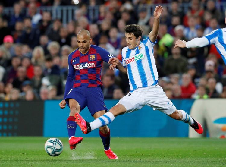 Martin Braithwaite i duel med Real Sociedads Ander Guevara. Foto: Albert Gea/Ritzau Scanpix