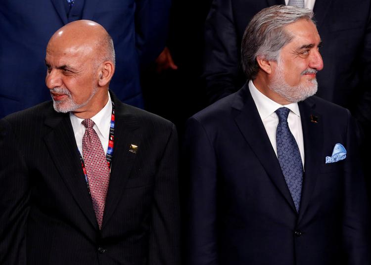 Ashraf Ghani og Abdullah Abdullah - har begge ladet sig indsætte som præsident i Afghanistan.. Foto: Jonathan Ernst/Ritzau Scanpix
