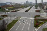  Wuhan, hovedstad i Hubei-provinsen, har i to måneder været lukket ned for at standse spredning af corona-viruset Covid-19. Nu er Præsident Xi taget på besøg for at demonstrere, at smittespredningen er under kontrol.
 Foto: Noel Celis/Ritzau Scanpix