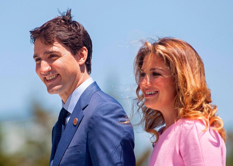 Den canadiske premierminister Justin Trudeau og hans hustru Sophie Gregoire Trudeau. Hun er smittet med coronavirus, og han går derfor i karantæne. Foto: Geoff Robins/Ritzau Scanpix