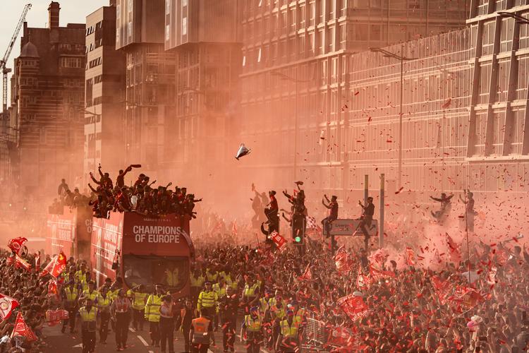 Sidste år oplevede Liverpools spillere at få en fantastisk modtagelse af klubbens fans, da holdet havde vunder Champions League.  Foto: Oli Scarff/AFP