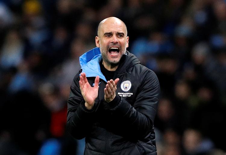 Manchester City-manager Pep Guardiola er en blandt en række fodboldprofiler, der nu donerer penge til den voksende kamp mod smitten af coronavirus. Foto: Phil Noble/Ritzau Scanpix