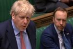 Boris Johnson og sundhedsminister Matt Hancock fotograferet ved en tidligere debat i parlamentet.  Foto: -/Ritzau Scanpix