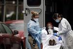 Reddere i beskyttelsesdragter hjælper en syg patient op i en ambulance i New York, lørdag. Byen er hårdt ramt af coronaepidemien. Foto: Stefan Jeremiah/Ritzau Scanpix