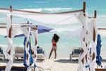 Turister på stranden i Cancun i Mexico. Foto: Jorge Delgado/Ritzau Scanpix