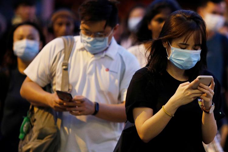 Singapore har haft status som et mønsterland,. Men nu går antallet af smittede kraftigt op. Foto: Edgar Su/Ritzau Scanpix